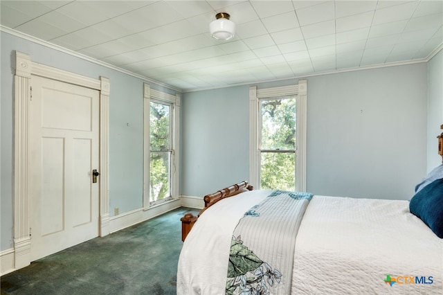 carpeted bedroom featuring ornamental molding