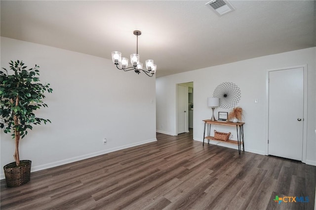 505 Bramble Bush Ln, Victoria, TX 77904 - unfurnished dining area featuring wood finished floors and a chandelier