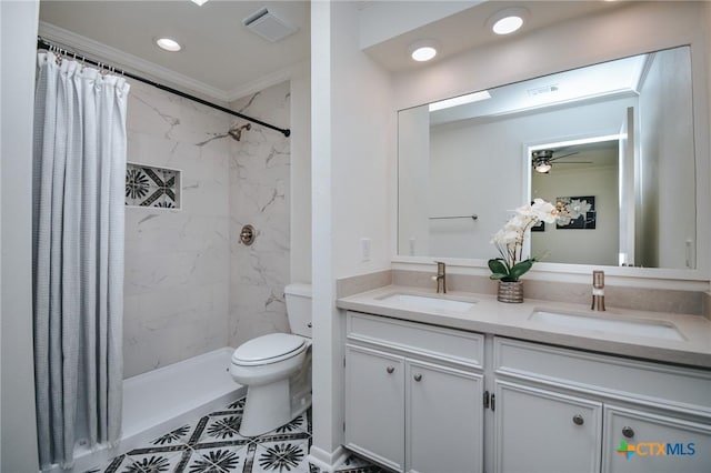 505 Bramble Bush Ln, Victoria, TX 77904 - bathroom featuring double vanity, a marble finish shower, ceiling fan, ornamental molding, and recessed lighting
