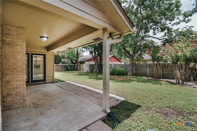 505 Bramble Bush Ln, Victoria, TX 77904 - fenced backyard featuring a patio area