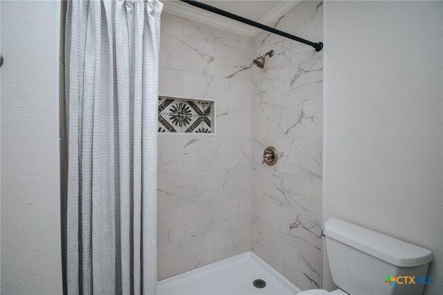 505 Bramble Bush Ln, Victoria, TX 77904 - bathroom featuring ornamental molding and a stall shower