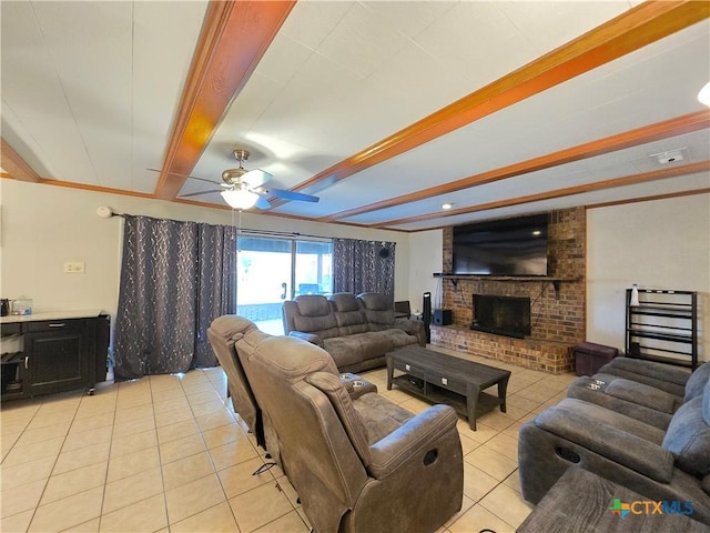 living room featuring light tile patterned floors, beam ceiling, a fireplace, and ceiling fan