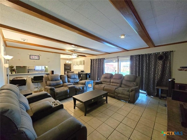 living room with beam ceiling, ceiling fan, and light tile patterned flooring