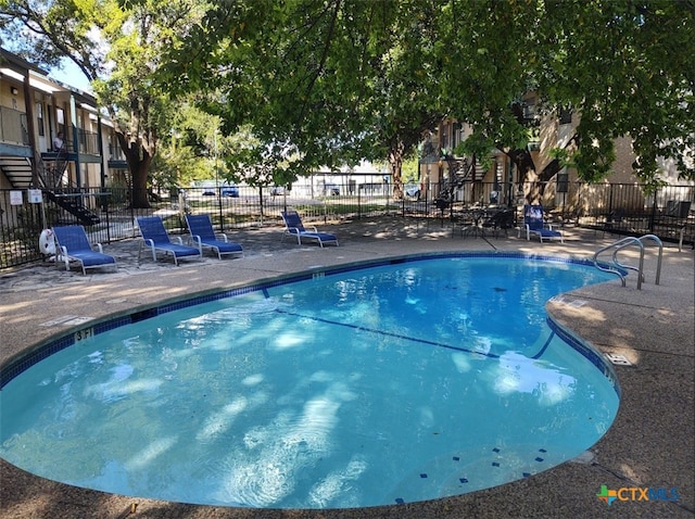 view of pool with a patio area