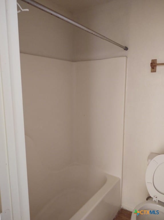 bathroom featuring toilet