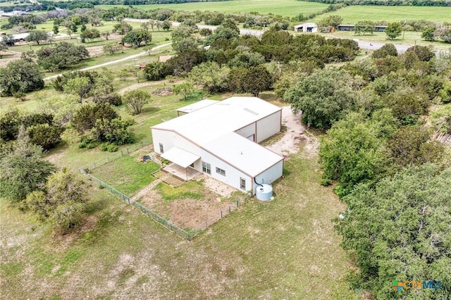 birds eye view of property with a rural view