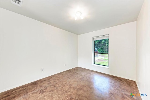 spare room featuring concrete floors