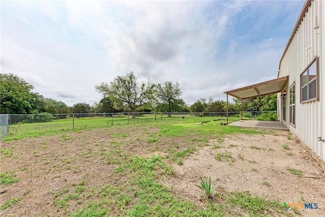 view of yard featuring a patio and a rural view