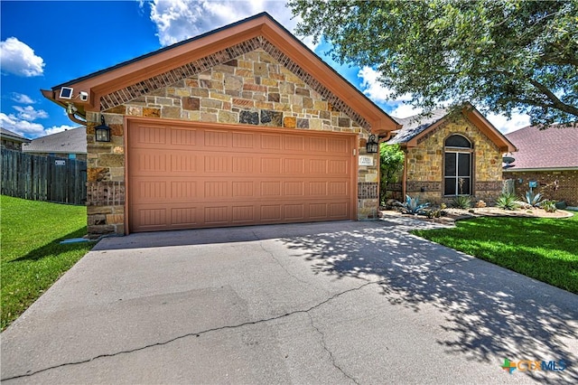 1521 Shadow Canyon Dr, Temple, TX 76502 - view of front facade featuring stone siding, driveway, and an attached garage