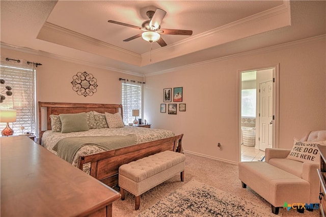 1521 Shadow Canyon Dr, Temple, TX 76502 - bedroom featuring a raised ceiling, crown molding, light carpet, ensuite bathroom, and a ceiling fan