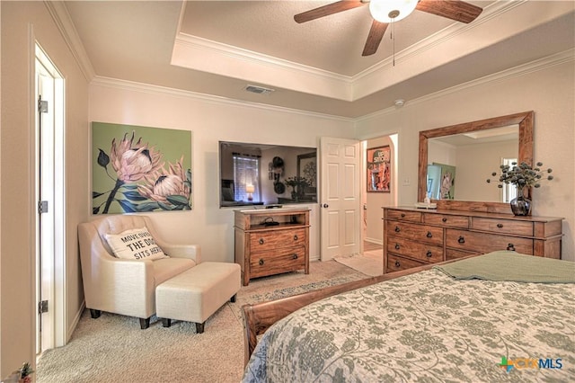 1521 Shadow Canyon Dr, Temple, TX 76502 - carpeted bedroom with a tray ceiling, crown molding, and ceiling fan