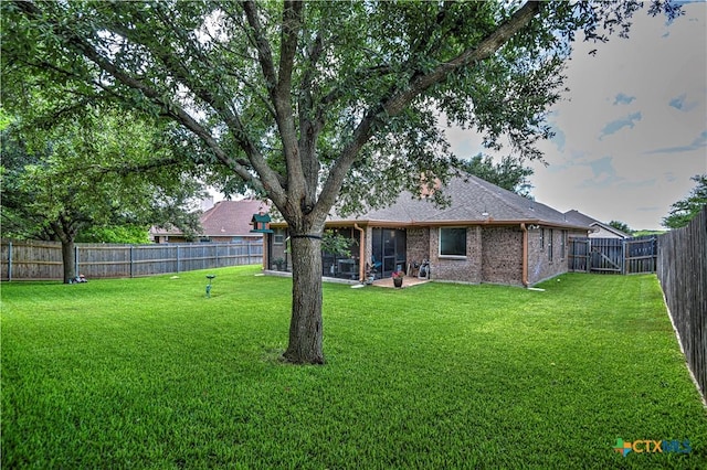 1521 Shadow Canyon Dr, Temple, TX 76502 - fenced backyard featuring a sunroom