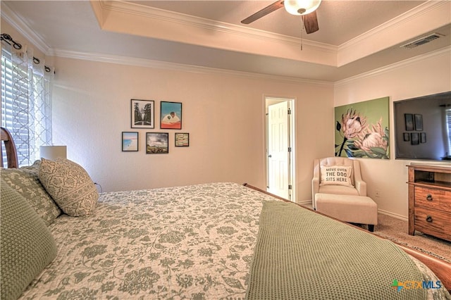 1521 Shadow Canyon Dr, Temple, TX 76502 - carpeted bedroom with a raised ceiling, ornamental molding, and a ceiling fan