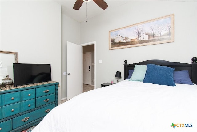 bedroom featuring lofted ceiling and ceiling fan