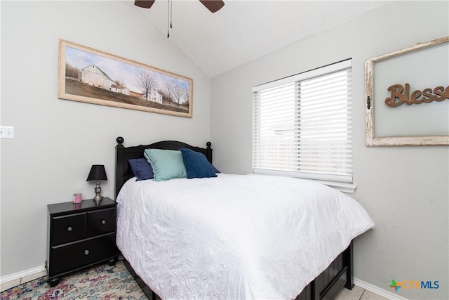 bedroom with ceiling fan and vaulted ceiling