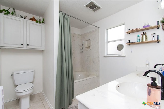 full bathroom featuring toilet, tile patterned flooring, vanity, and shower / bath combo