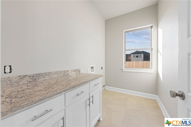 bathroom with vanity and tile patterned flooring