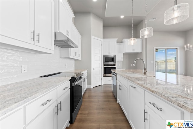 kitchen with sink, appliances with stainless steel finishes, decorative light fixtures, white cabinets, and dark hardwood / wood-style flooring