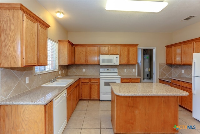 kitchen with decorative backsplash, sink, white appliances, and a kitchen island