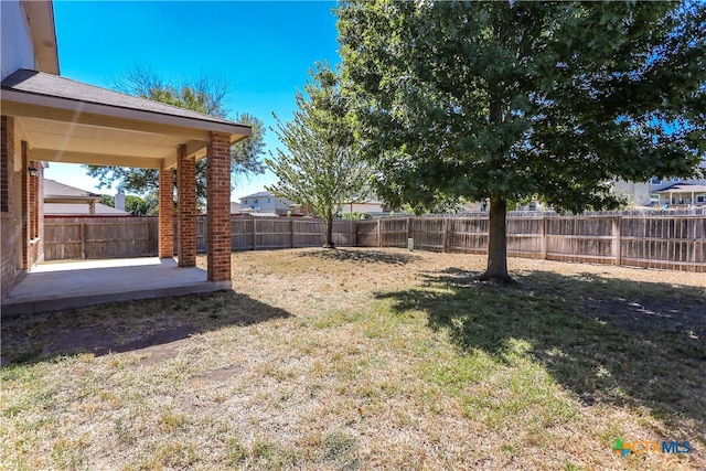 view of yard with a patio area