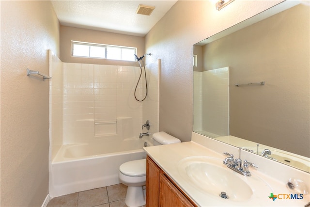 full bathroom featuring vanity, a textured ceiling, shower / tub combination, tile patterned flooring, and toilet