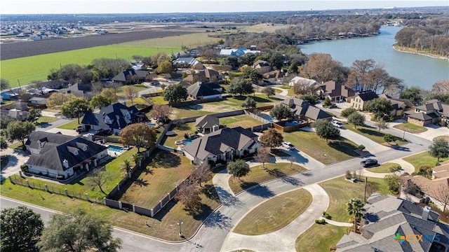 birds eye view of property featuring a water view