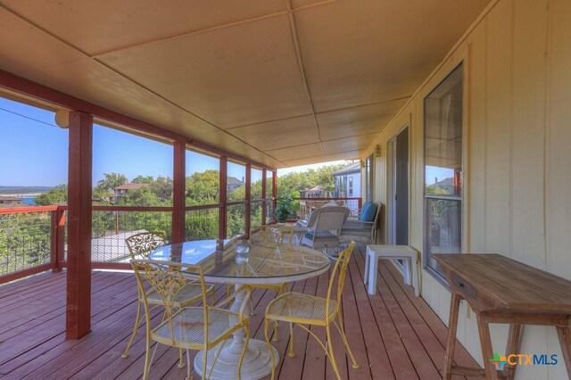 1871 Patty Dr, Canyon Lake, TX 78133 - wooden deck with outdoor dining space