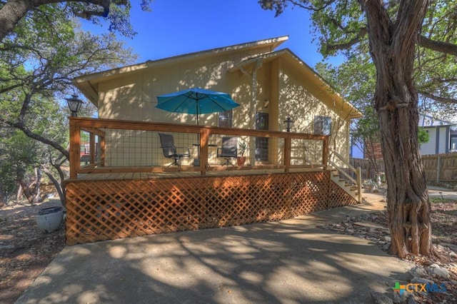 1871 Patty Dr, Canyon Lake, TX 78133 - back of property with a wooden deck