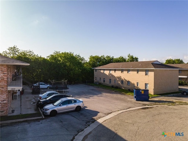 1203 Urbantke Ct Unit A-H, Copperas Cove, TX 76522 - view of car parking featuring a trampoline