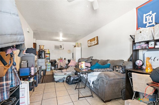 1203 Urbantke Ct Unit A-H, Copperas Cove, TX 76522 - tiled living area featuring a textured ceiling and a ceiling fan