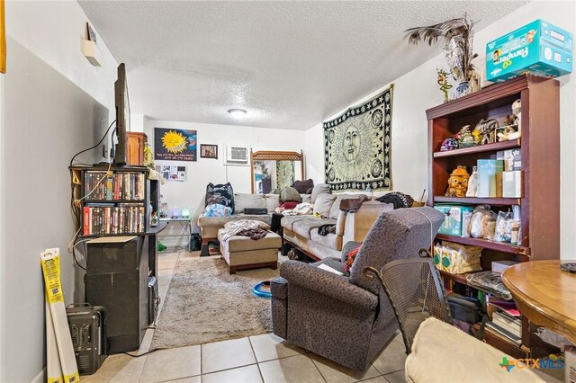 1203 Urbantke Ct Unit A-H, Copperas Cove, TX 76522 - living area featuring a textured ceiling and light tile patterned flooring
