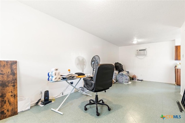 1203 Urbantke Ct Unit A-H, Copperas Cove, TX 76522 - office area featuring a wall unit AC, a textured ceiling, and tile patterned floors
