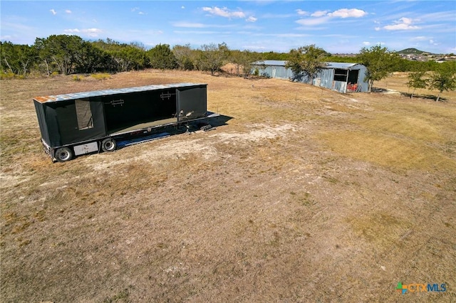 exterior space with a rural view