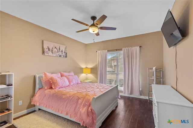 204 Crosswind Dr, Victoria, TX 77904 - bedroom featuring dark wood finished floors and a ceiling fan