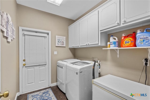 204 Crosswind Dr, Victoria, TX 77904 - washroom with washer and clothes dryer and cabinet space