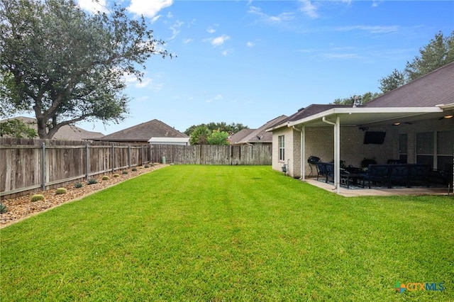 204 Crosswind Dr, Victoria, TX 77904 - fenced backyard with a patio