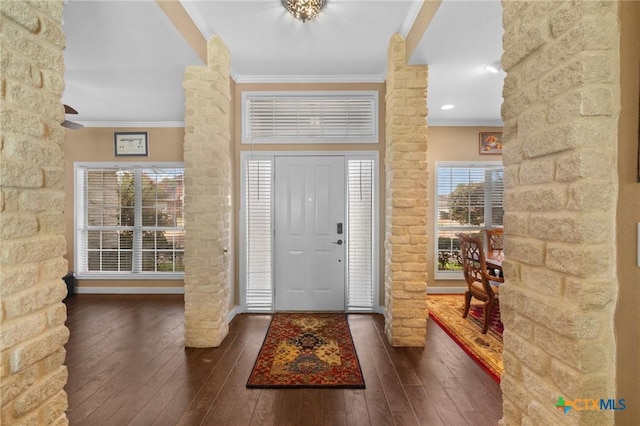 204 Crosswind Dr, Victoria, TX 77904 - entrance foyer with ornamental molding, ornate columns, and hardwood / wood-style floors