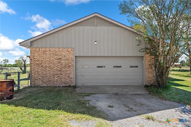 garage with a lawn