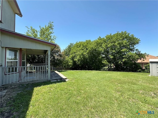 2707 Tripp Trl, Killeen, TX 76543 - view of green lawn with a patio area