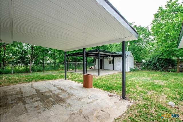 view of patio / terrace featuring a shed