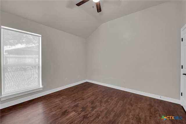 unfurnished room featuring ceiling fan, dark hardwood / wood-style flooring, and lofted ceiling