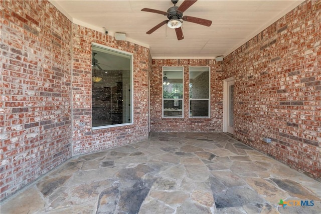 view of patio with ceiling fan