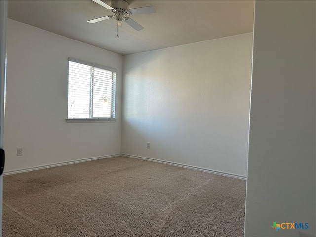 unfurnished room with carpet floors and ceiling fan