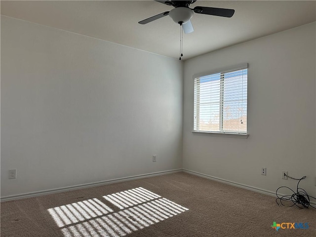 carpeted empty room with ceiling fan