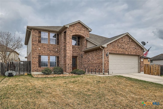 traditional-style home featuring a front yard, concrete driveway, brick siding, and fence