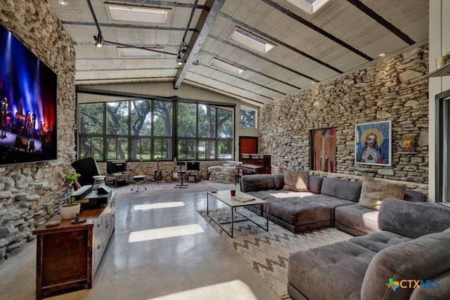 interior space featuring wood ceiling and lofted ceiling with beams