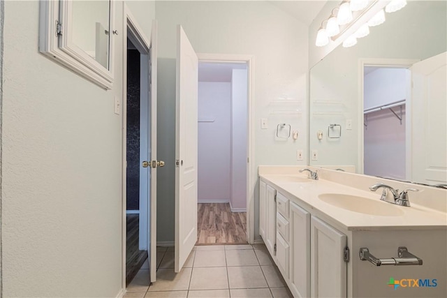 bathroom with vanity and tile patterned floors