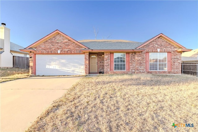 ranch-style home with a garage