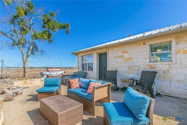 view of patio / terrace featuring grilling area and an outdoor living space