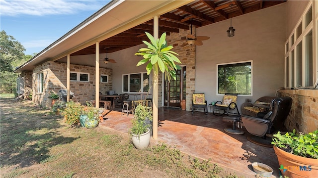 view of patio / terrace with grilling area and ceiling fan